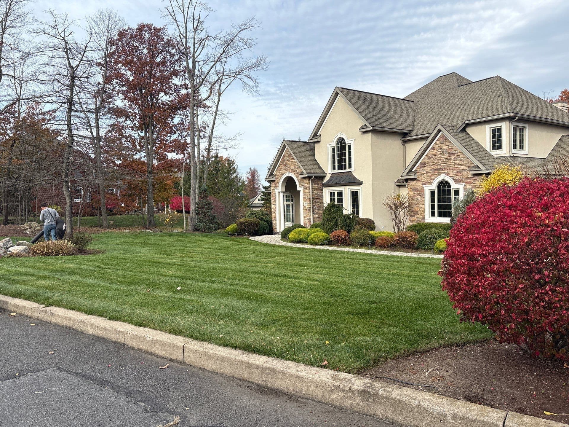 Embrace the Beauty of Fall with Our Lawn Care Services image