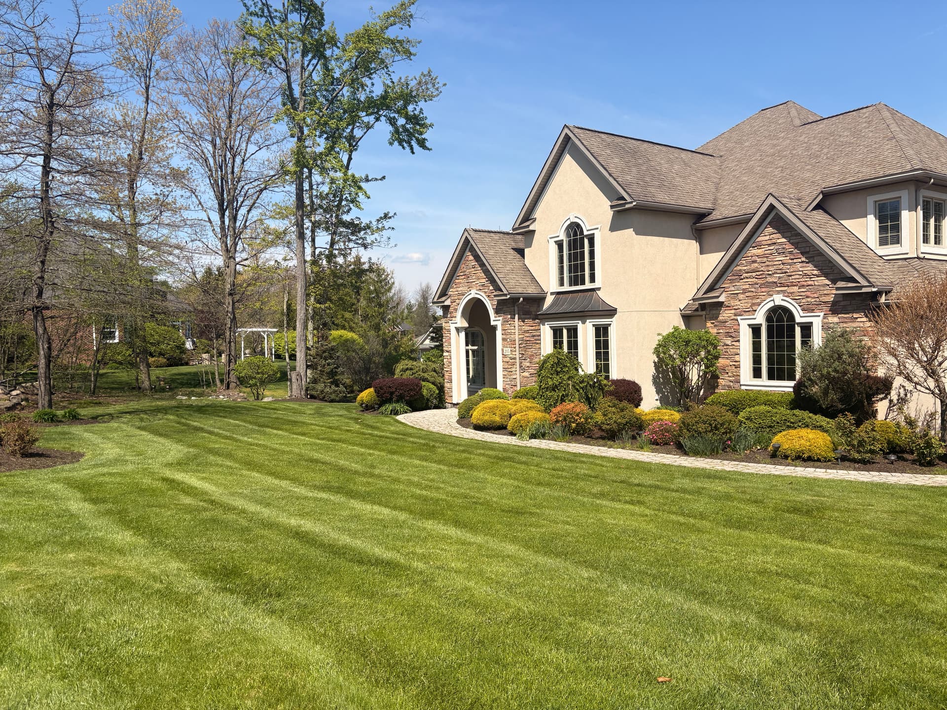 A Well-Kept Lawn Frames Your Home Better Than Anything Else image